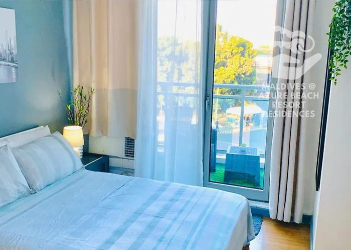 아파트호텔 Quelson's Pad In Azure Beach Residences With Wave Pool Access *